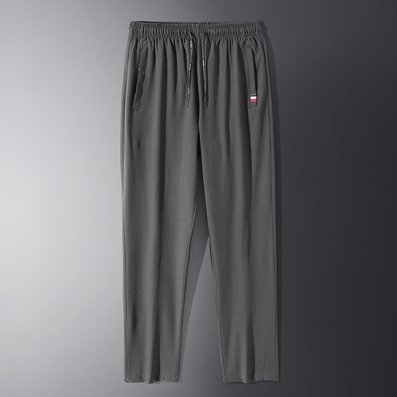 

Новый год Весна и Осень Новые повседневные брюки Мужские спортивные брюки Мужские Корейский стиль Мода Свободные Прямые 5XL серый