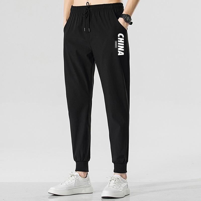 Pants men's trend summer thin loose large size fat guy 0kg casual tied feet nine-point sports trousers