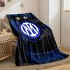 Intertwined white letters in a blue circle, two gold stars above, wood-like background. for all seasons blanket lunch break throw gift