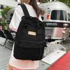 Spring and summer washed cloth labeled student schoolbag Korean version casual daily large-capacity backpack