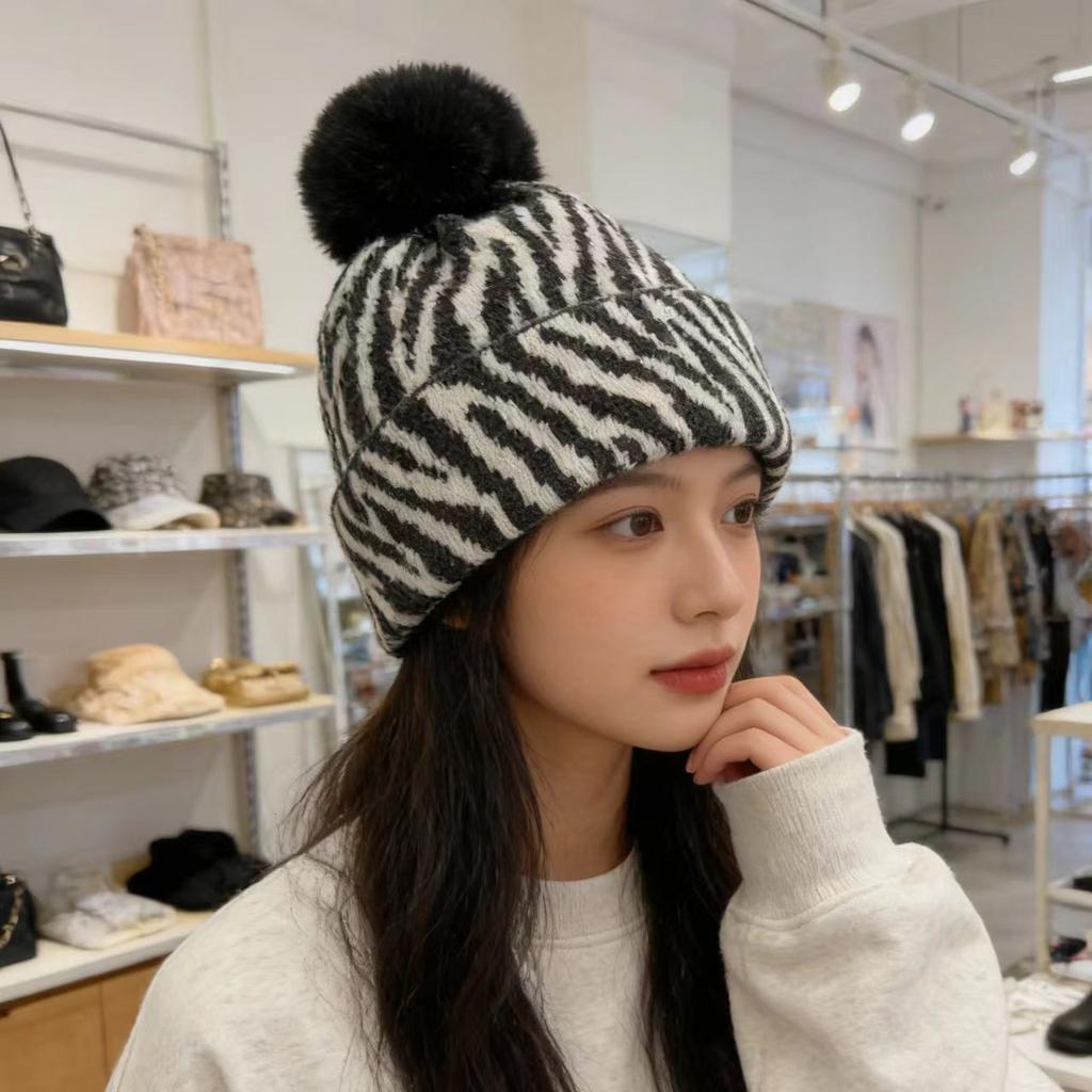 Zebra pattern hairball knitted hat women's autumn and winter retro versatile face small wool hat cold-proof warm ear hat