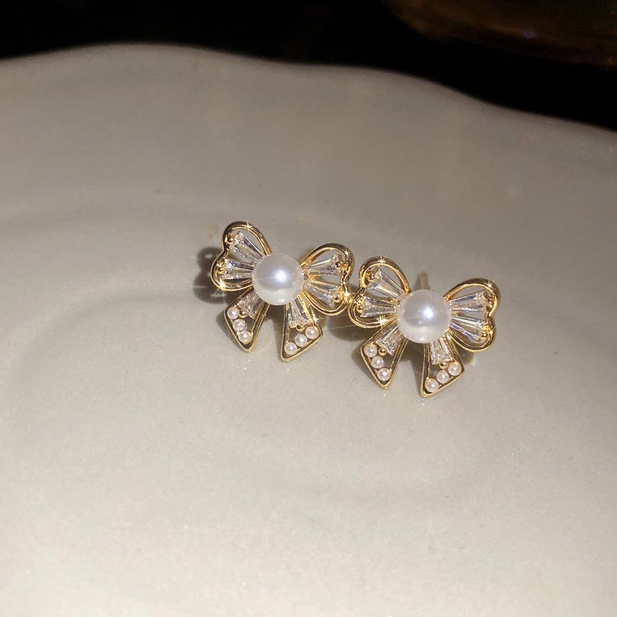 Silver needle zircon bow pearl stud earrings retro personality fashion temperament earrings light luxury high-end earrings