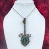 Faceted Zambian Emerald Pendant Copper Wire Wrapped Pendant Dainty Guitar Jewelry