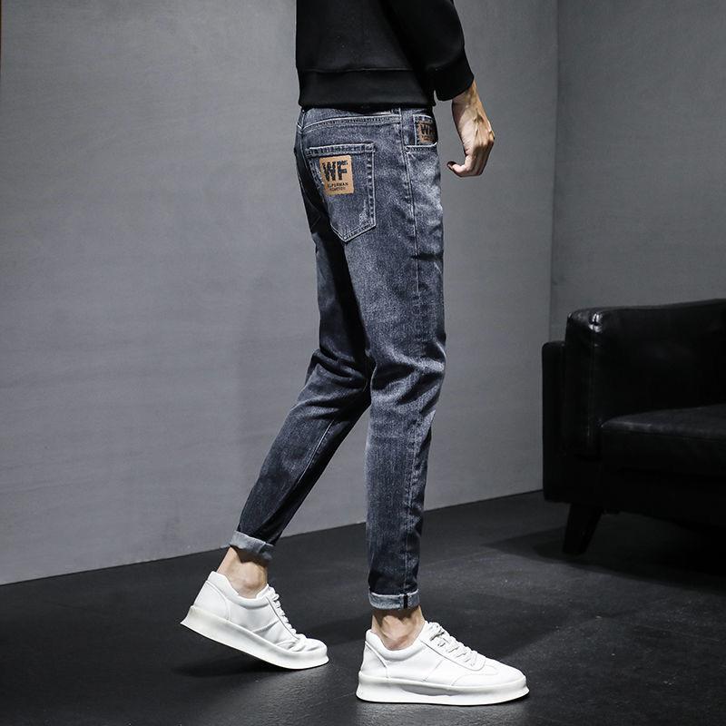 Vaqueros para hombre marea versión coreana de la marea de primavera y otoño flujo Slim pies pequeños nuevo verano sección delgada pantalones largos vaqueros negros para hombre