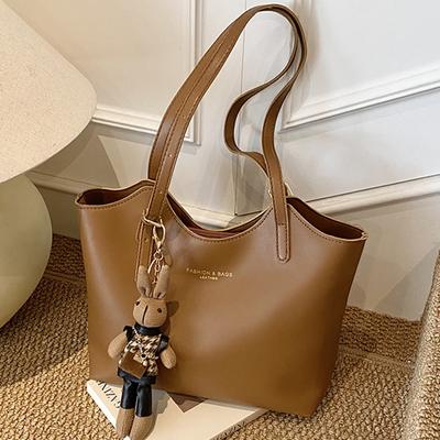 Sac de navette tempérament sac grande capacité sac pour femme nouveau sac fourre-tout rétro tendance simple épaule sac aisselle
