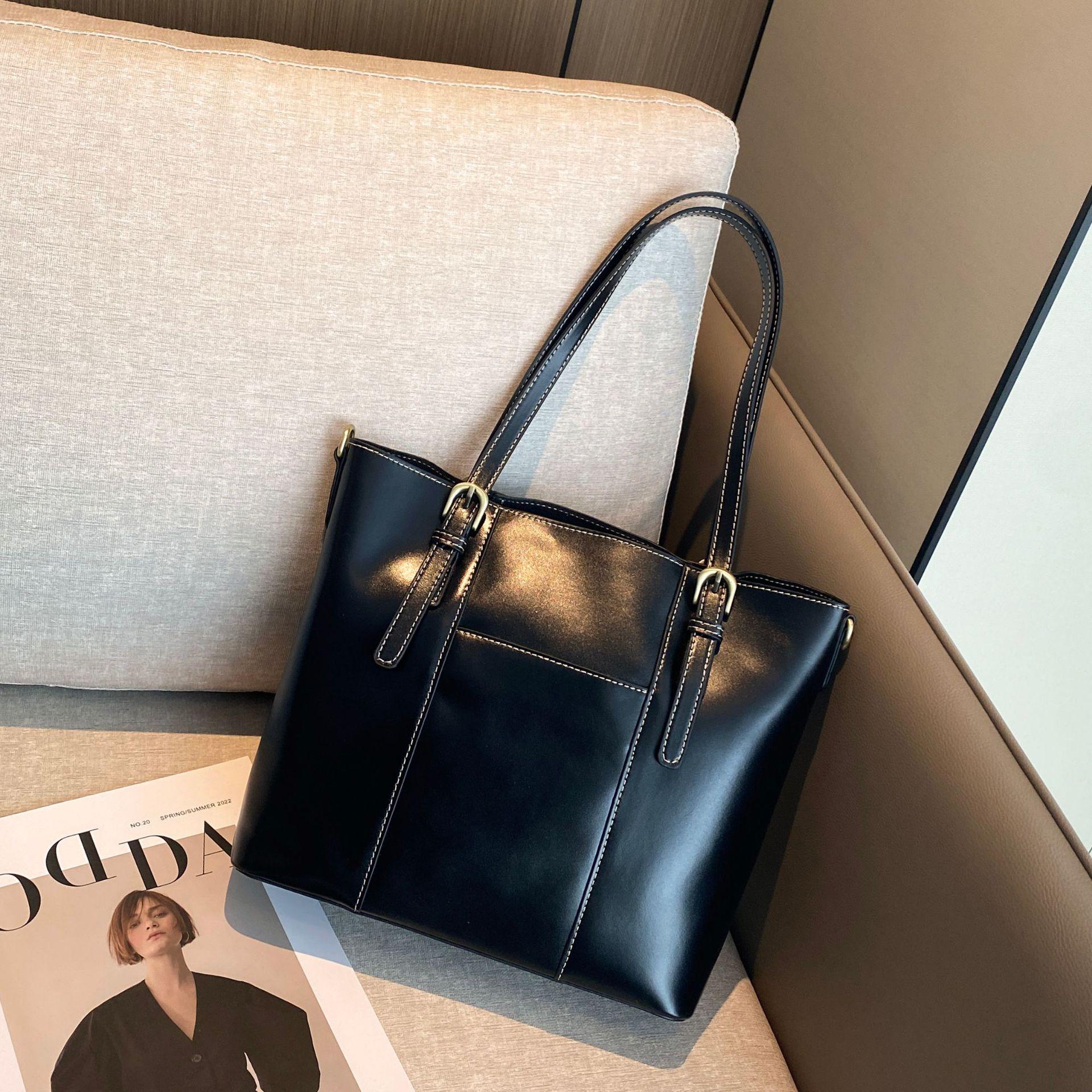 

Женская сумка из коровьей кожи, сумка-шоппер через плечо, простая модная сумка для девушек, большая сумка из натуральной кожи 28cm10cm26cm length, width and height чёрный