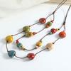 Ethnic style color irregular beaded necklace long chain double stacked wearing high-end temperament fashion niche sweater chain