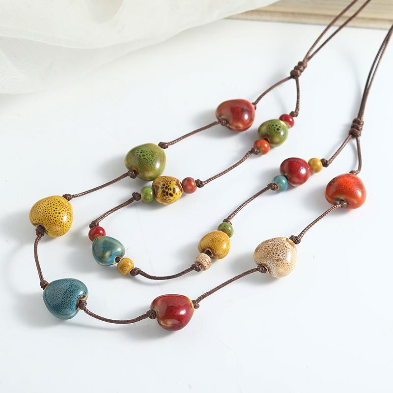 Ethnic style color irregular beaded necklace long chain double stacked wearing high-end temperament fashion niche sweater chain