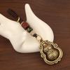 Rotating Brass Gourd Fortune Keychain with Auspicious Cloud Pendant