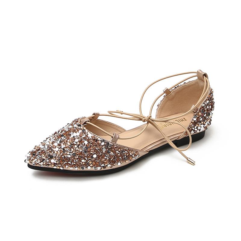 

2025 лето новые римские сандалии студенческий стиль универсальные ремешки фея обувь полая сумка голова плоская подошва большой размер 41-43 43 золотой