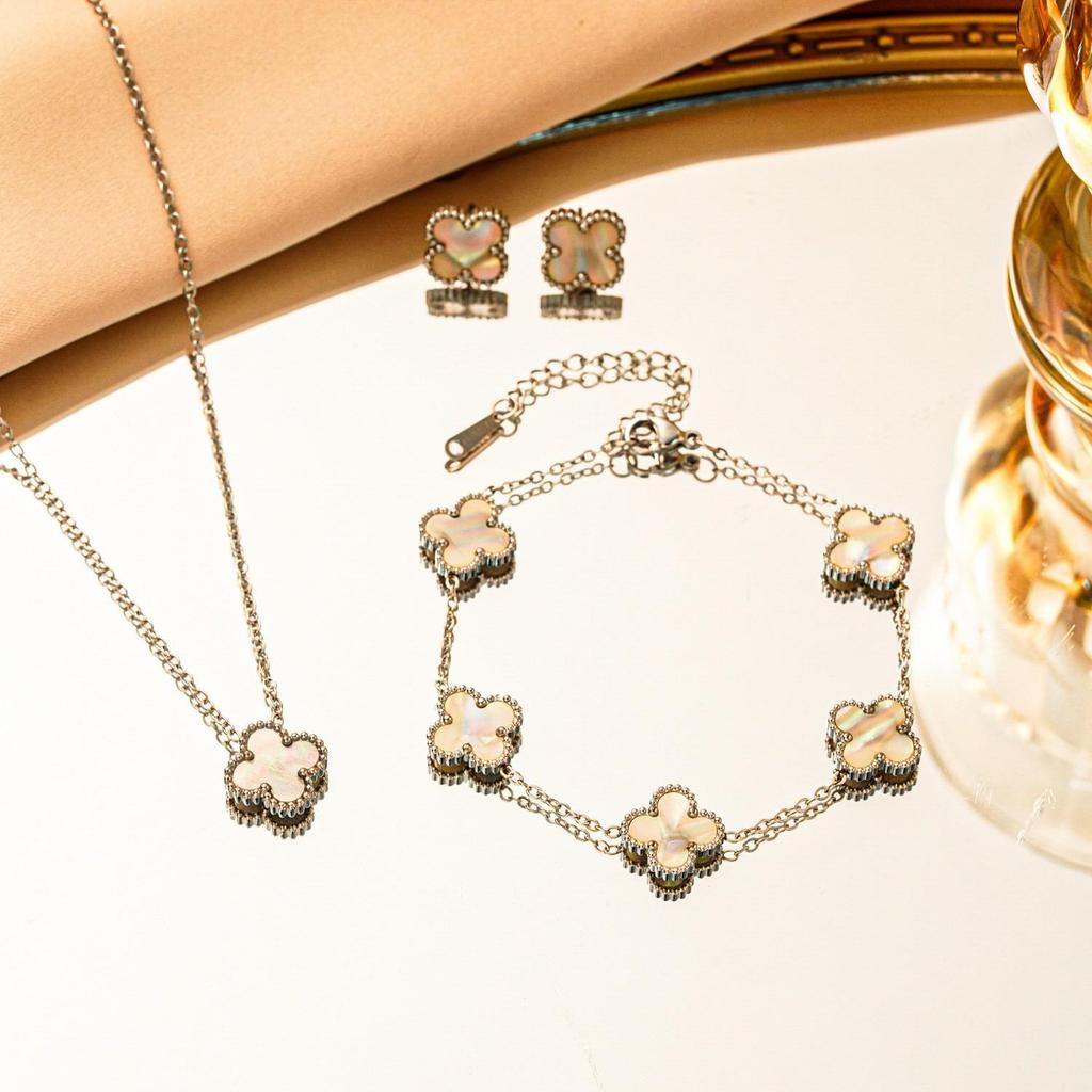 Set 3 pezzi collana bracciale orecchini quadrifoglio double-face in acciaio al titanio