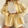 Casual Striped Two-Piece Set: Long-Sleeved Shirt & Wide-Leg Pants with High-Waist Shorts.