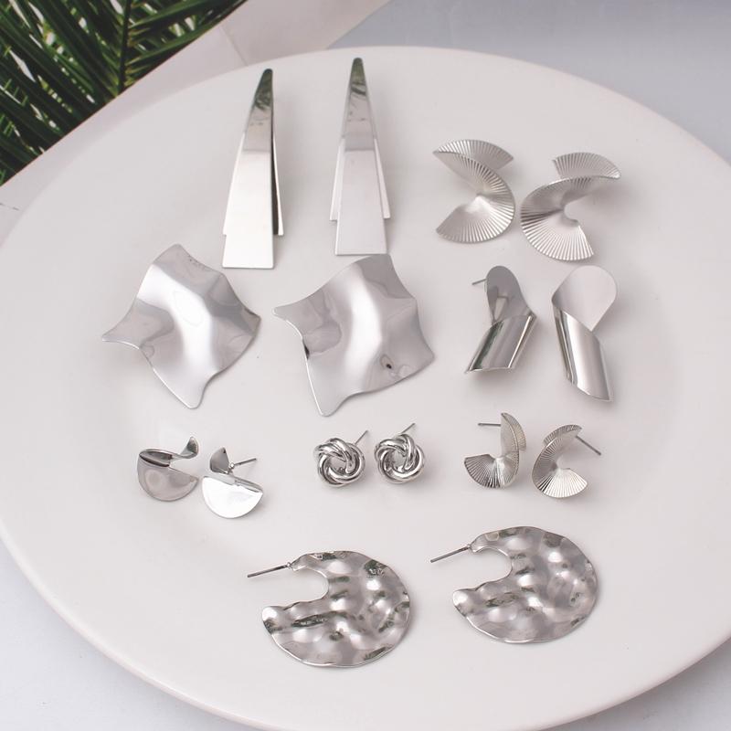 Przesadna geometria Nieregularne metalowe wiszące kolczyki Spiralny skręcony węzeł Okrągłe gładkie Brincos Cyrkonia