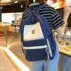 New schoolbag female high school student backpack junior high school student large capacity student third to sixth grade schoolbag