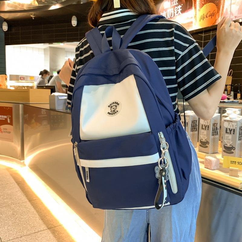 New schoolbag female high school student backpack junior high school student large capacity student third to sixth grade schoolbag