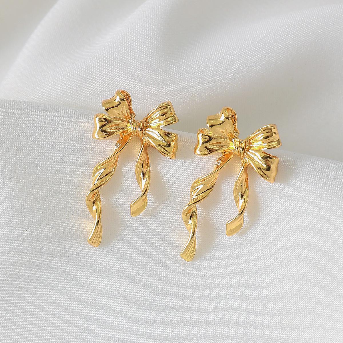 Eco-friendly Gold Bow Trendy Alloy Earrings