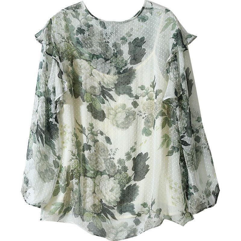 Zomerblouse voor dames van chiffon met groene bloemenprint en ruches aan de zoom.