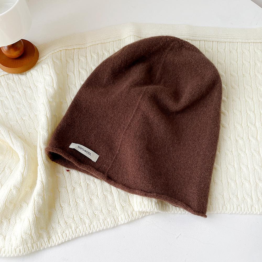 Solid color wool knitted stacking hat women's autumn and winter 0% all-wool knitted hat fashionable versatile cold hat ear protection hat