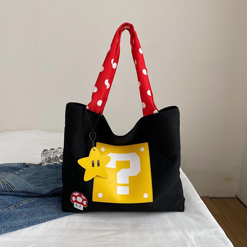 

Commuter large-capacity canvas bag, women s new versatile shoulder bag, college student class tote bag чорний