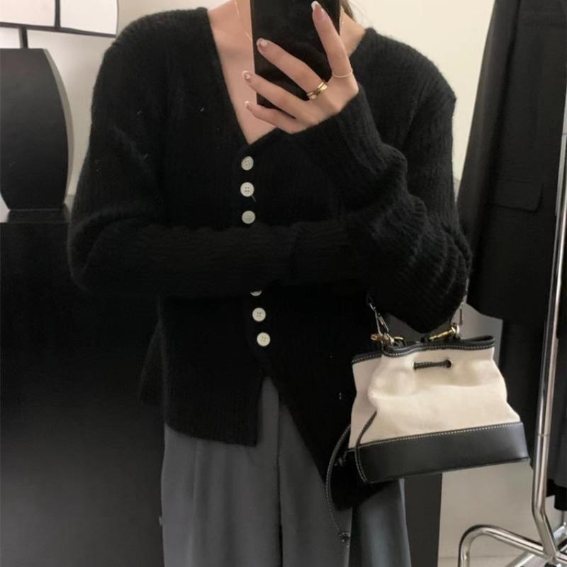 Design sense irregular knitted cardigan top women's autumn and winter new temperament commuting thin inner sweater