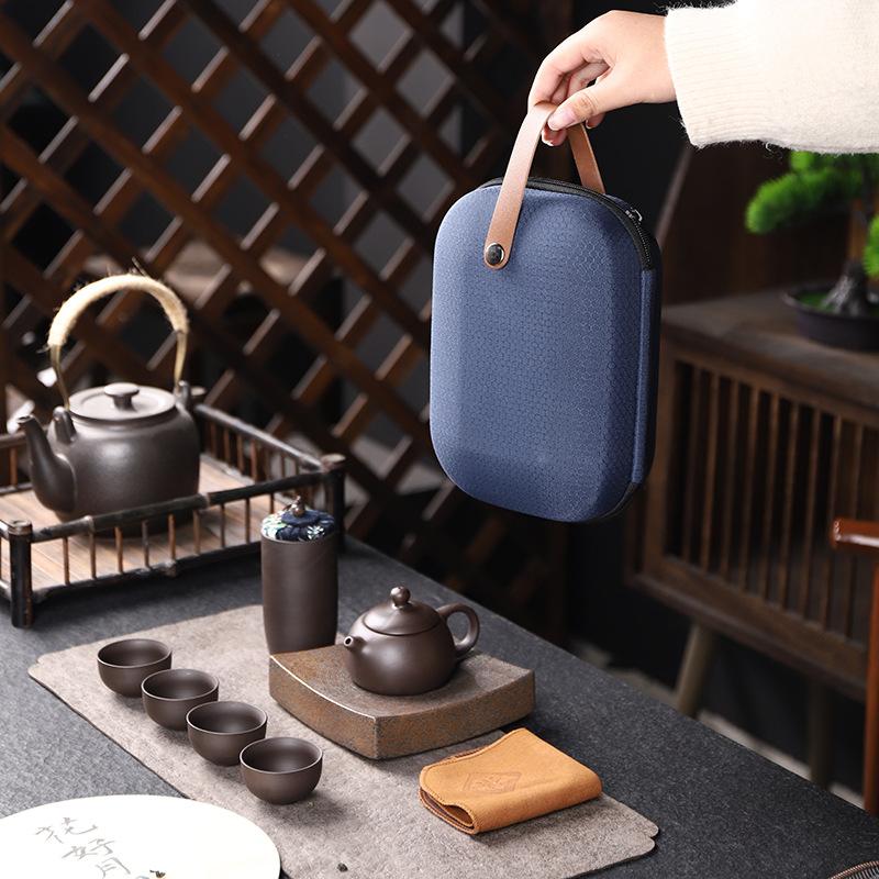 Purple sand travel kung fu tea set, one pot, four cups, portable bag, express cup, small gifts for outdoor business activities