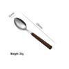 4-Piece High-End Stainless Steel Cutlery Set with Wooden Handles: Includes Knife, Fork, Spoon, and Teaspoon for Western Cuisine.