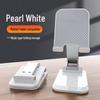 Adjustable Folding Tablet & Phone Stand for Desktops – Ideal for Multi-Use and Live Streaming