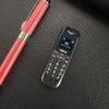 J60 4G Small Phone OLED Screen 1GB ROM Bluetooth Alarm Clock Mp3 Player 600mAh LTE Super Light Mini Portable Mobile Phone Multi-language