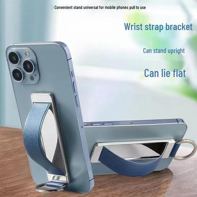Multifunctional Leather Wristband and Finger Ring Stand for Mobile Phones - Anti-Drop, Desk Stand, and Pull-Out Design.