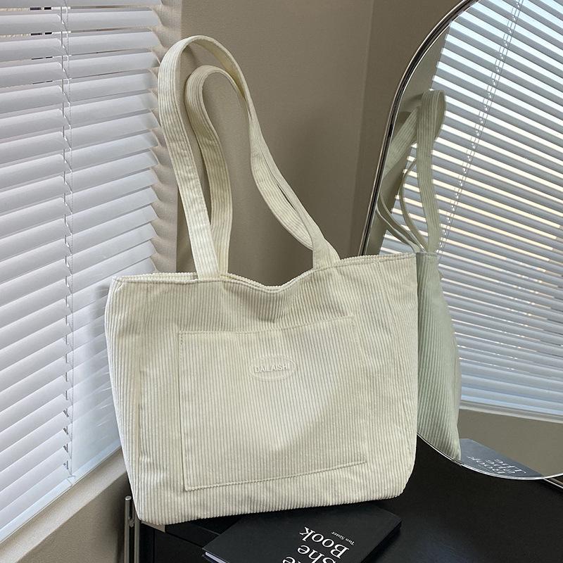 

Retro simple corduroy large-capacity tote bag women s autumn and winter new one-shoulder crossbody underarm casual handbag белый