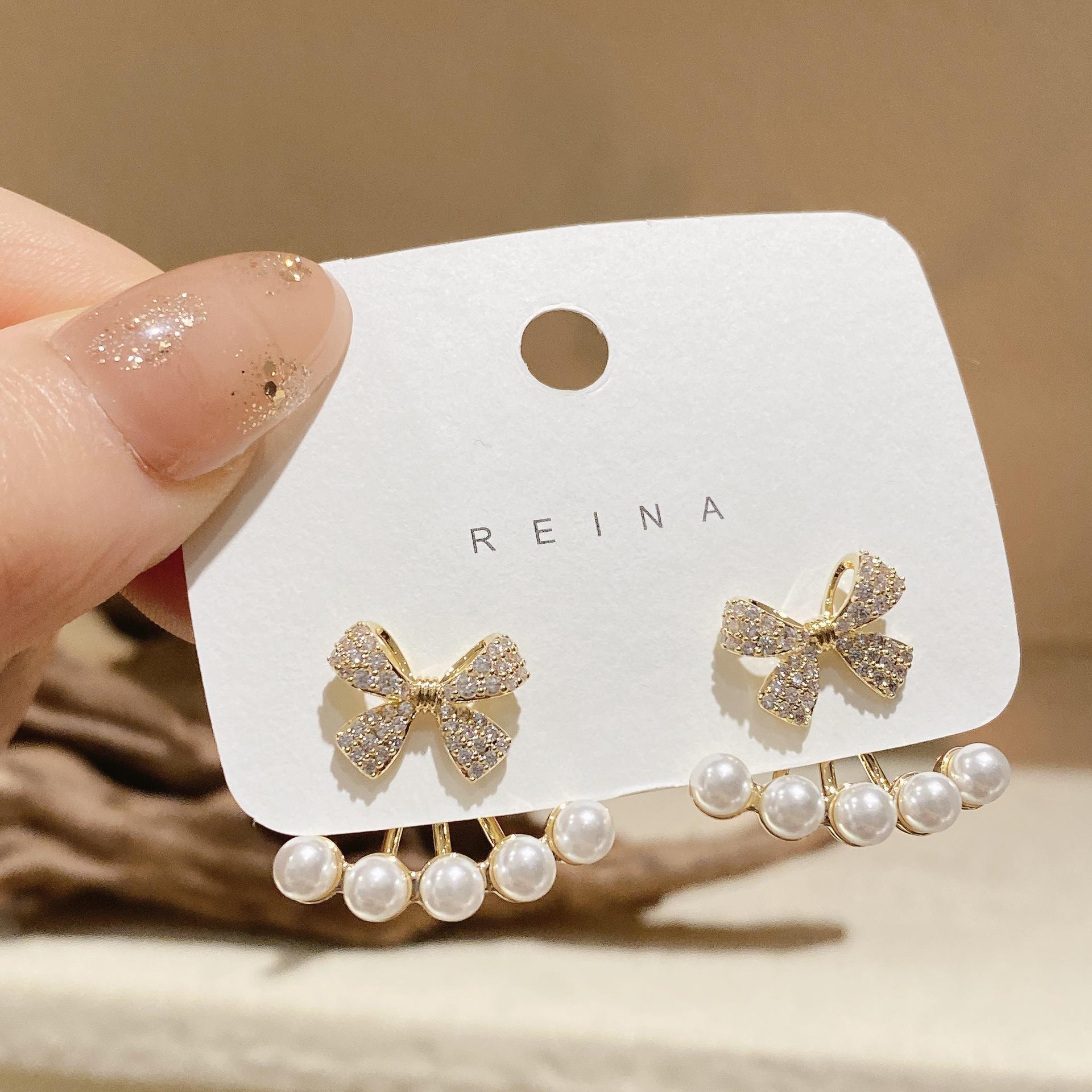 

A two-tie pearl stud earrings for women s niche design sterling silver earrings, new popular earrings.