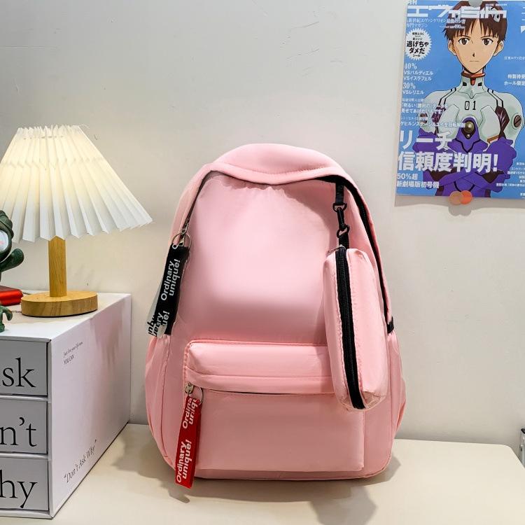 

Sweet solid color backpack, simple and versatile macaron campus style, cute student schoolbag with pencil bag of the same color розовый