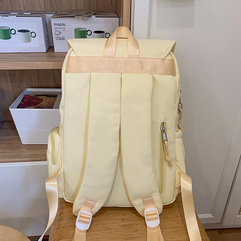 School bag 2025 new versatile large-capacity multi-compartment school bag small fresh and sweet solid color backpack pain bag commuter backpack