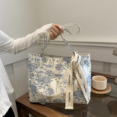 Sac fourre-tout en toile imprimé à porter sous le bras pour femme 2025 nouveau sac à bandoulière de niche littéraire sac étudiant brodé