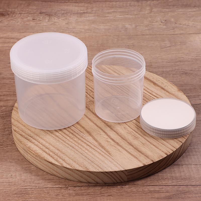 Průhledná uzavřená plechovka s víkem Plastová prázdná balící láhev Kruhové úložiště kbelík Sklenice na sušenky Potravinářské uzavřené plechovky Nádržka