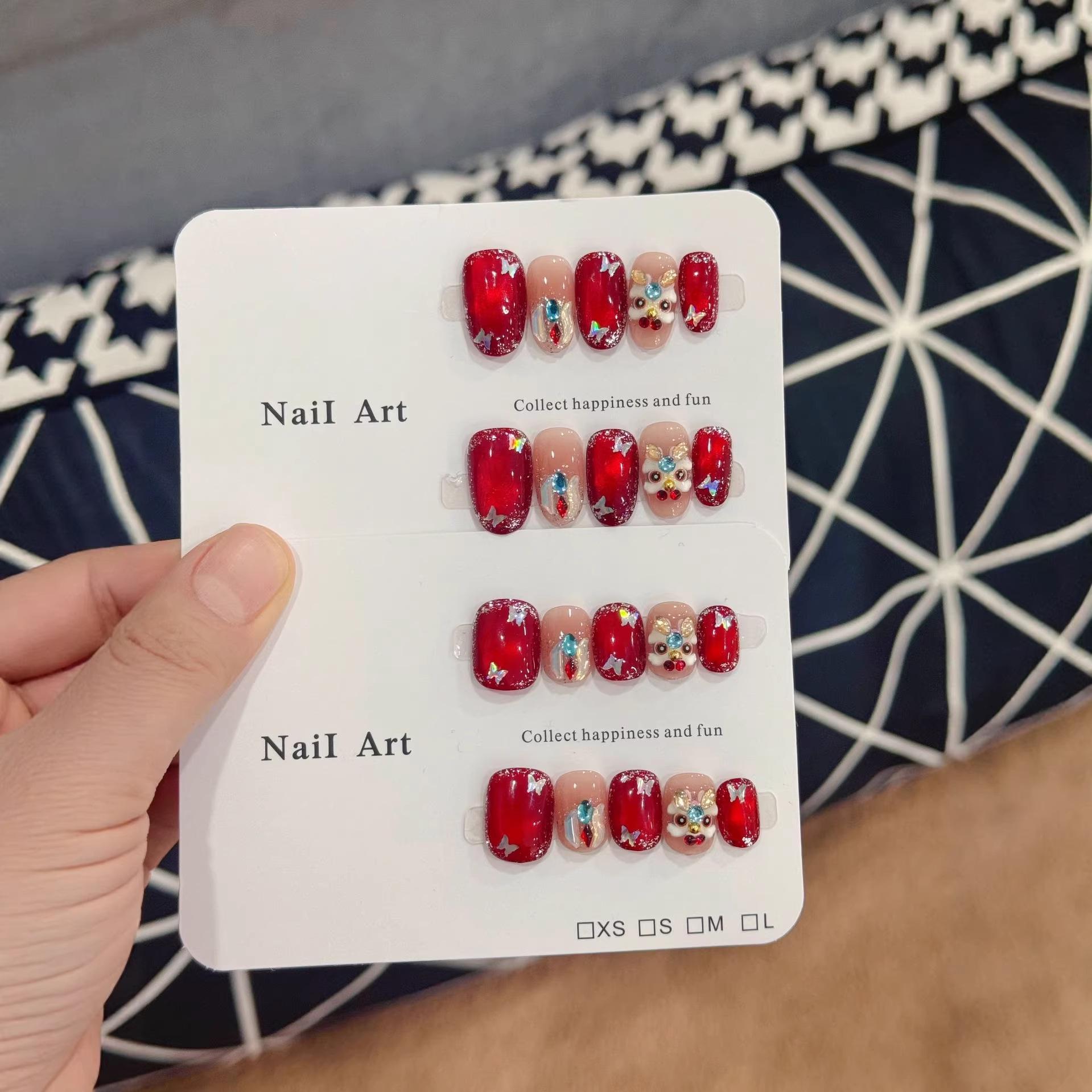 New Year S11-21 Angora Red Cat s Eye 3D Lion Press-on Nails with Silver Butterfly Accents and Skin Whitening.