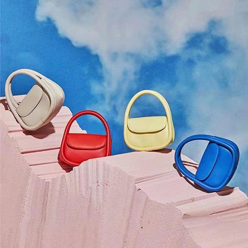 Summer fresh min handbag hand carry trendy versatile messenger bag high sense leather soft European bag niche bag