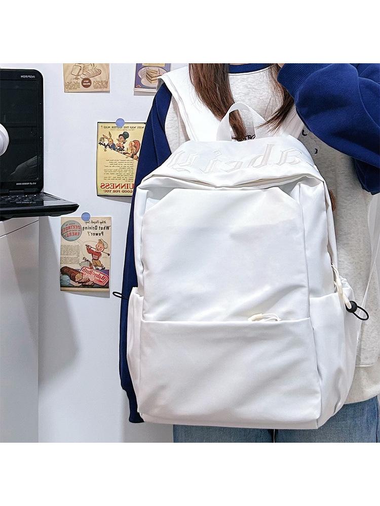 Schoolbag simple solid color middle and high school student schoolbag female 1011 new male large capacity backpack short trip backpack