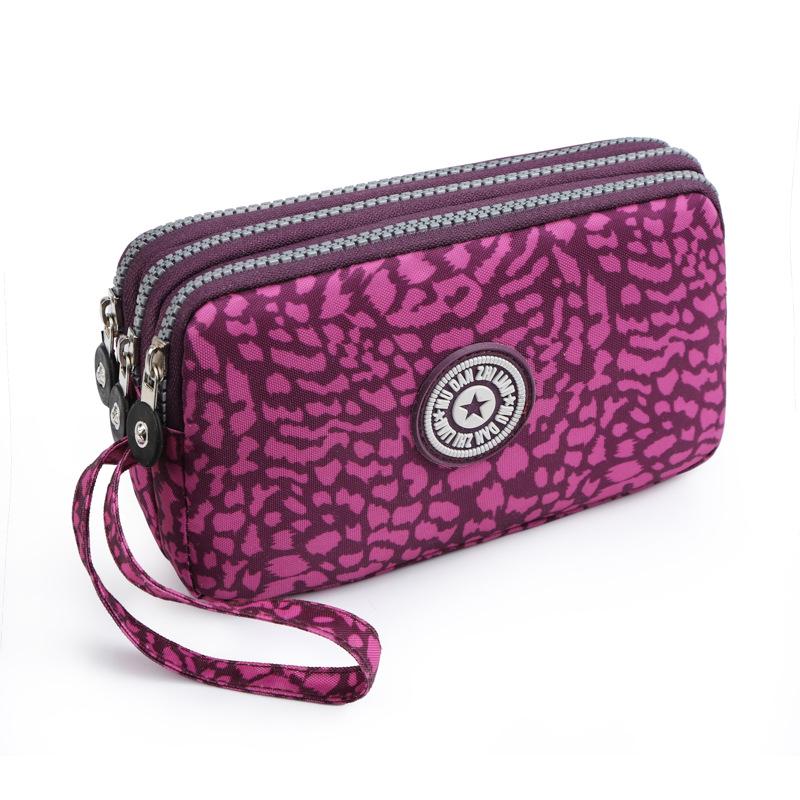 

Washable Denim Women s Multi-Compartment Clutch: Coin, Makeup, & Phone Storage.