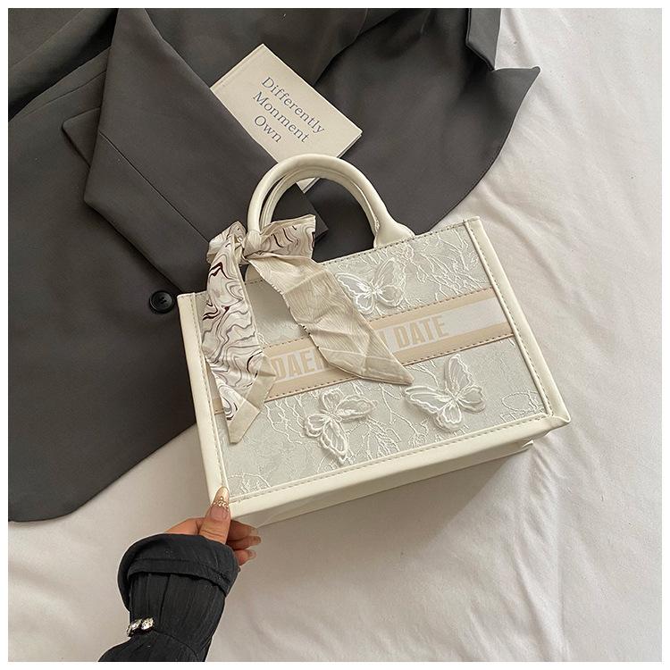 

2025 summer new women s bag foreign style hand bag large capacity texture women s bag embroidery portable tote bag high sense