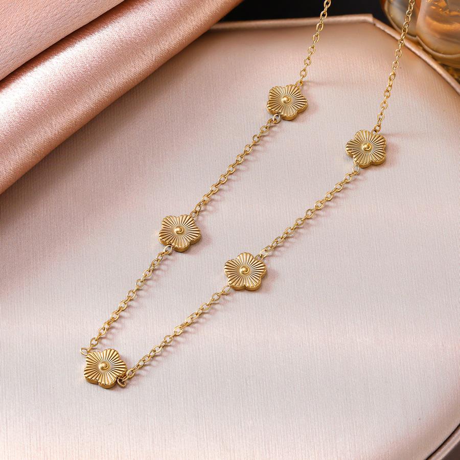 9mm Five-Petal Flower Jewelry Set: Bracelet, Necklace, Earrings, Ring in Women's Stainless Steel