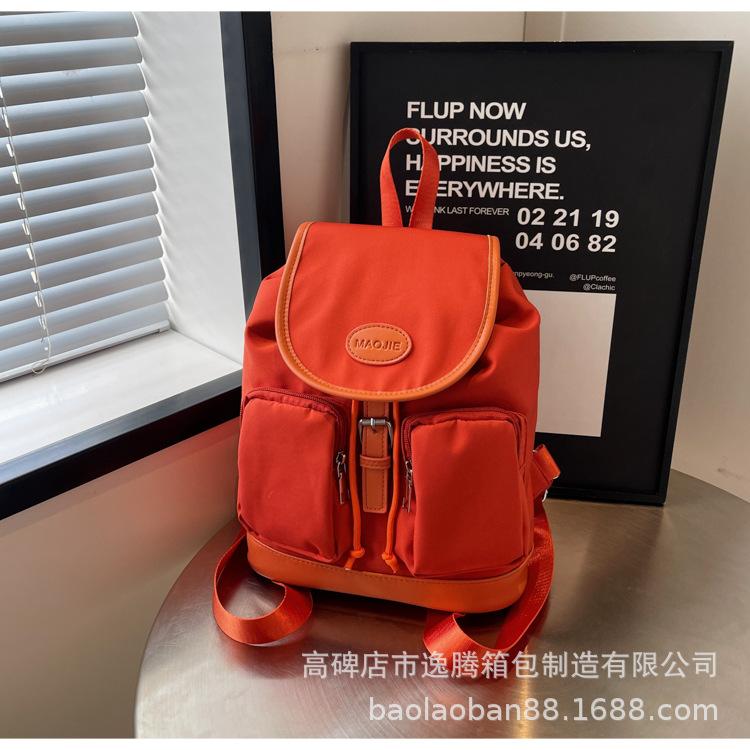 

Double shoulder schoolbag lazy wind women 2024 new college style niche design simple and versatile Internet celebrity small backpack помаранчевий