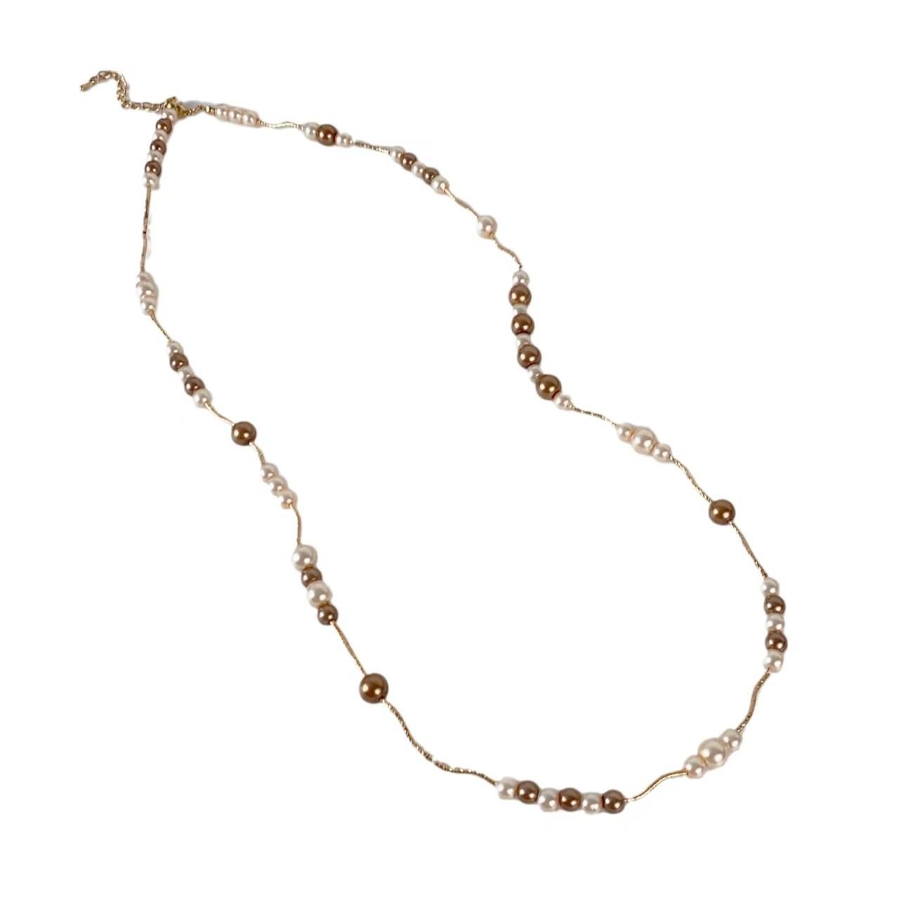 

Fashion light luxury pearl stacked necklace female niche design high sense collarbone chain autumn and winter versatile sweater accessories