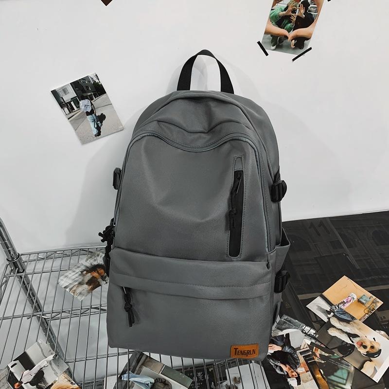New backpack men's large-capacity high-end school bag female junior high school students high school students simple casual computer backpack