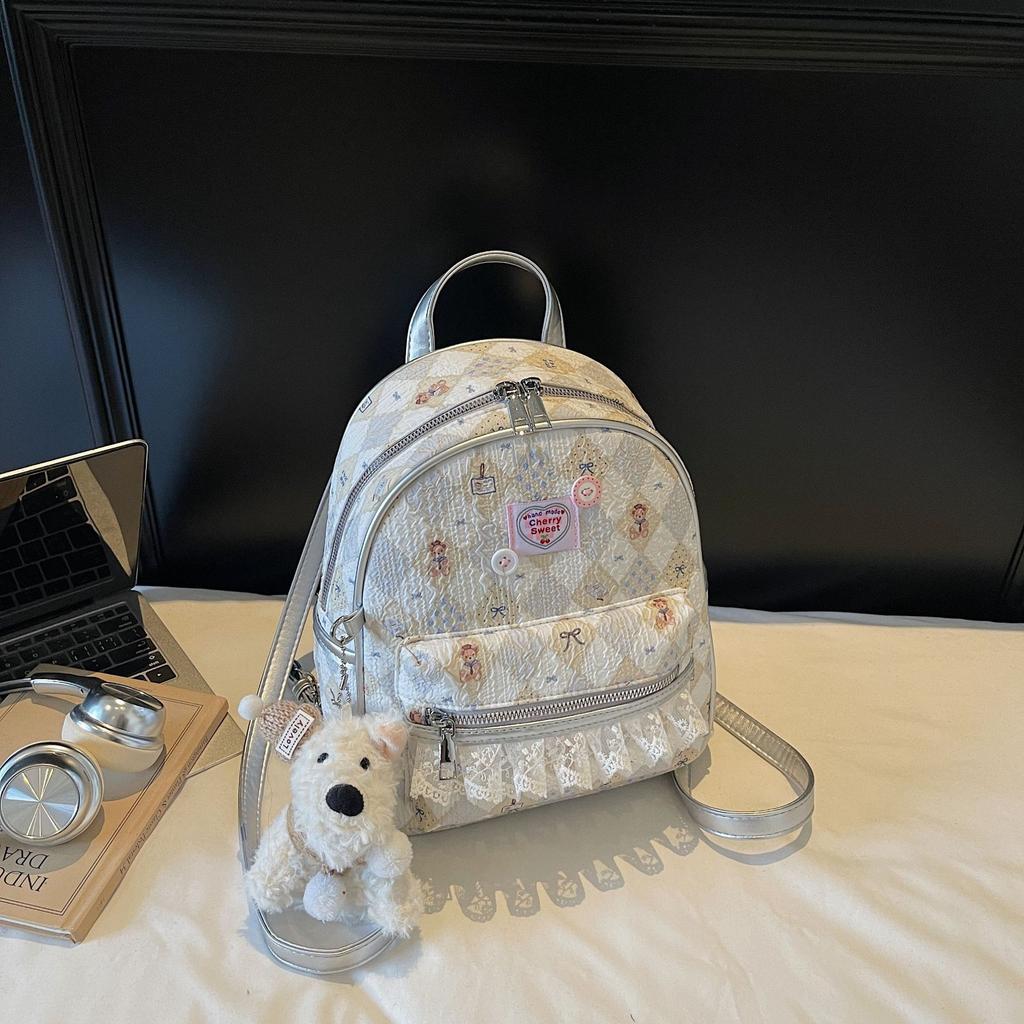 Schoolbag New Niche Graffiti Women's Backpack 1011 Light Luxury Large Capacity Fashion Versatile Commuter Backpack Student School Bag
