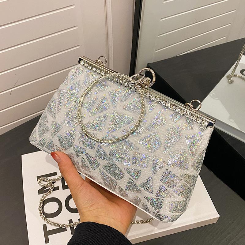 Geantă rotundă cu închidere de mână din paiete pentru cină