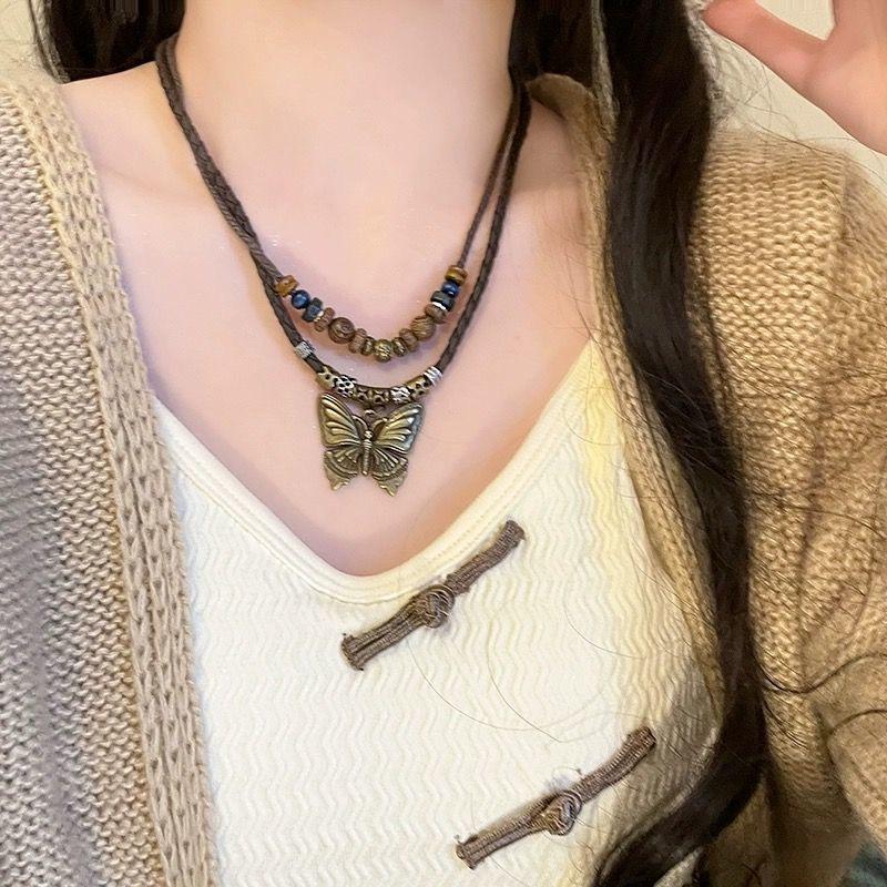 Bohemian Ethnic Style Long Bow Metal Necklace with Vintage Distressed Pendant (2025)