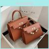 Borsa Piccola Quadrata Minimalista Urbana alla Moda con Chiusura a Moschettone Borsa a Mano in PU con Texture Transfrontaliera da Donna