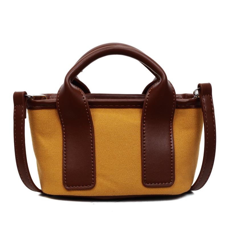

Retro simple contrasting handbag women s 2025 summer new Korean foreign-style niche commuter shoulder messenger bag жёлтый