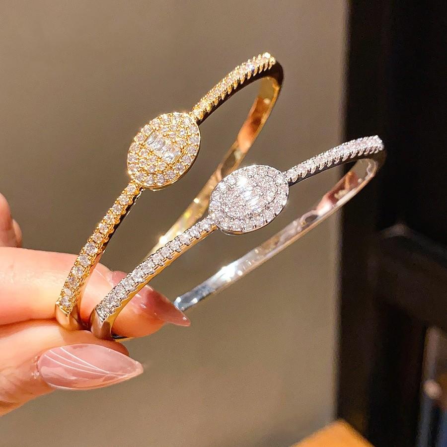 Modeschmuck Ovaler Zirkon Kupferarmband Mit Vergoldung Für Elegantes Tragen